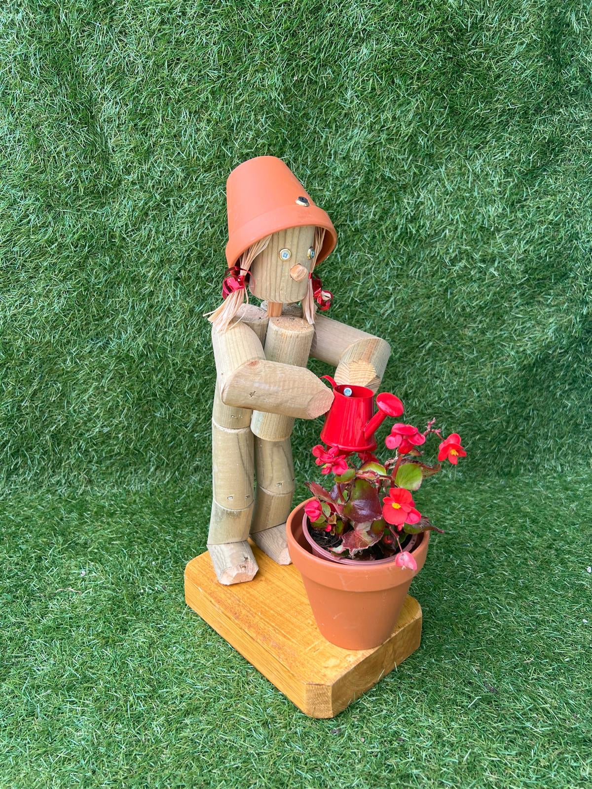 Little Girl or Boy holding a watering can