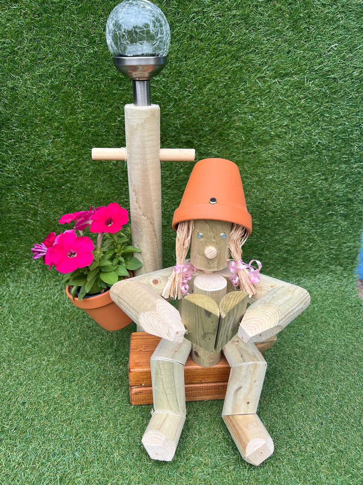 Girl or Boy Reading a book witch a Solar Light