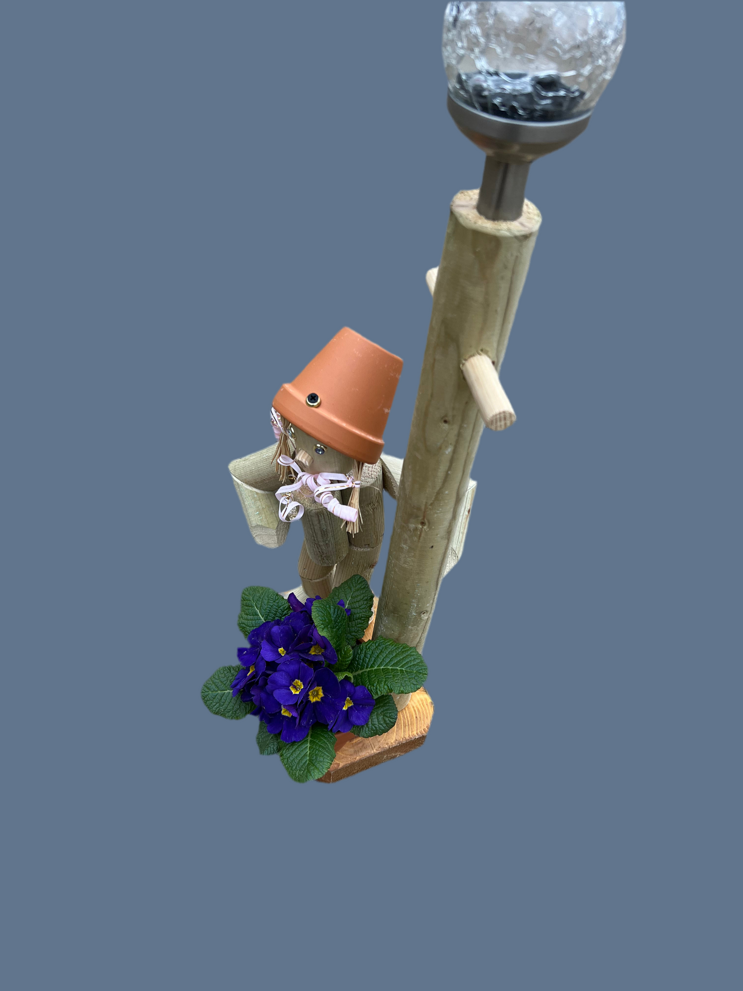 Little girl or boy with a tall lamp post