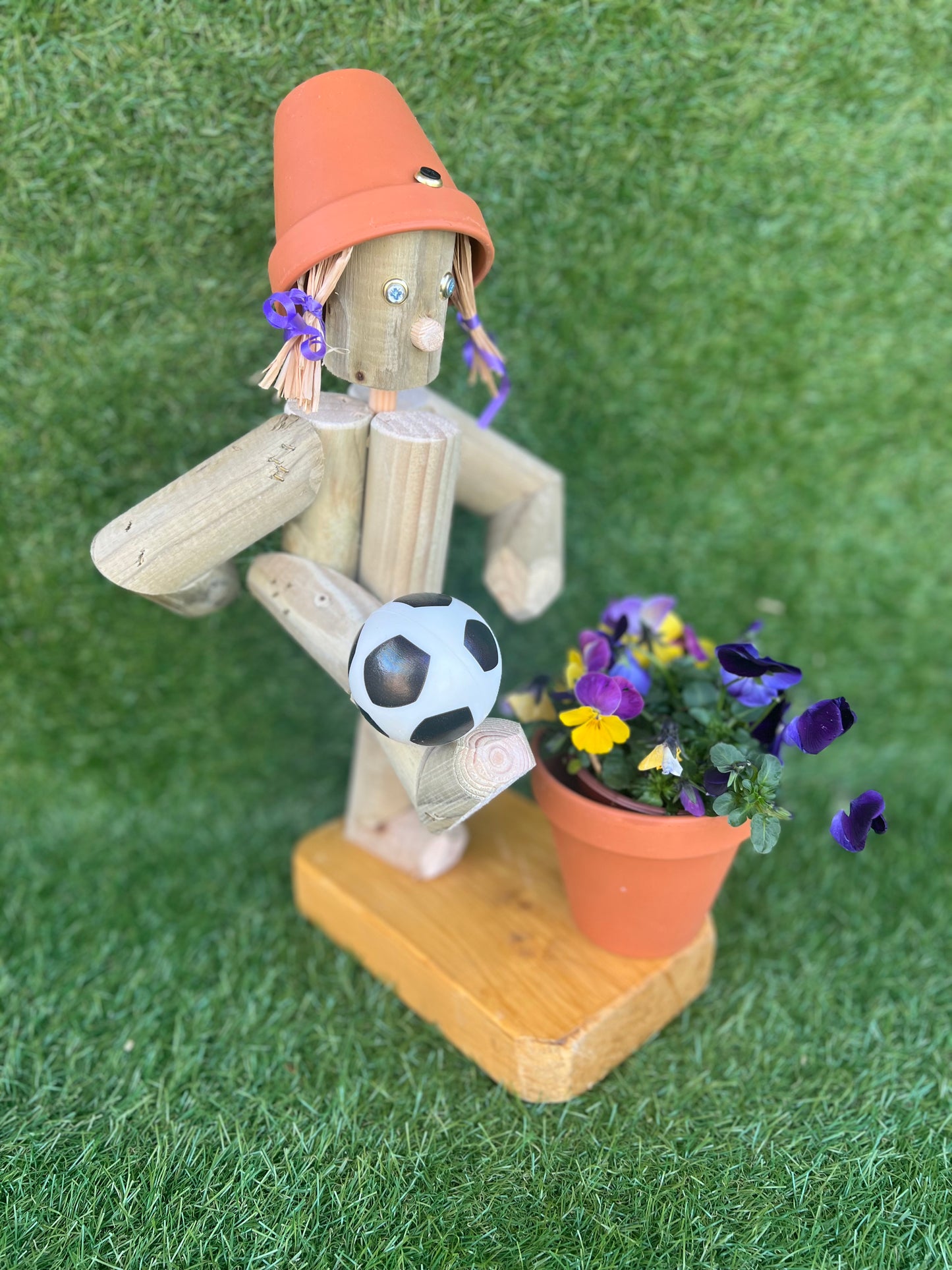 Adorable Boy/Girl with Flower Pots – Kicking a Ball