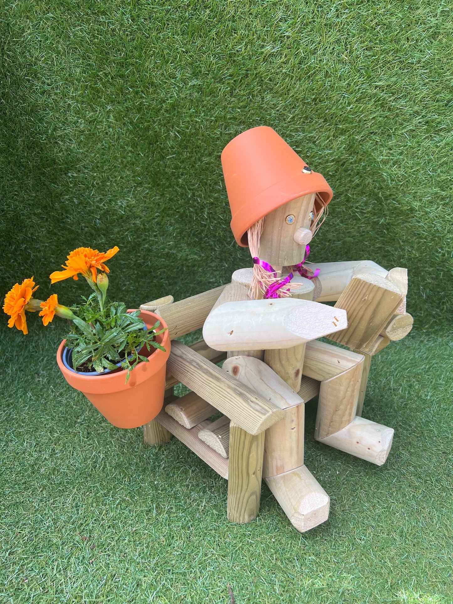 A girl on a chair reading a book