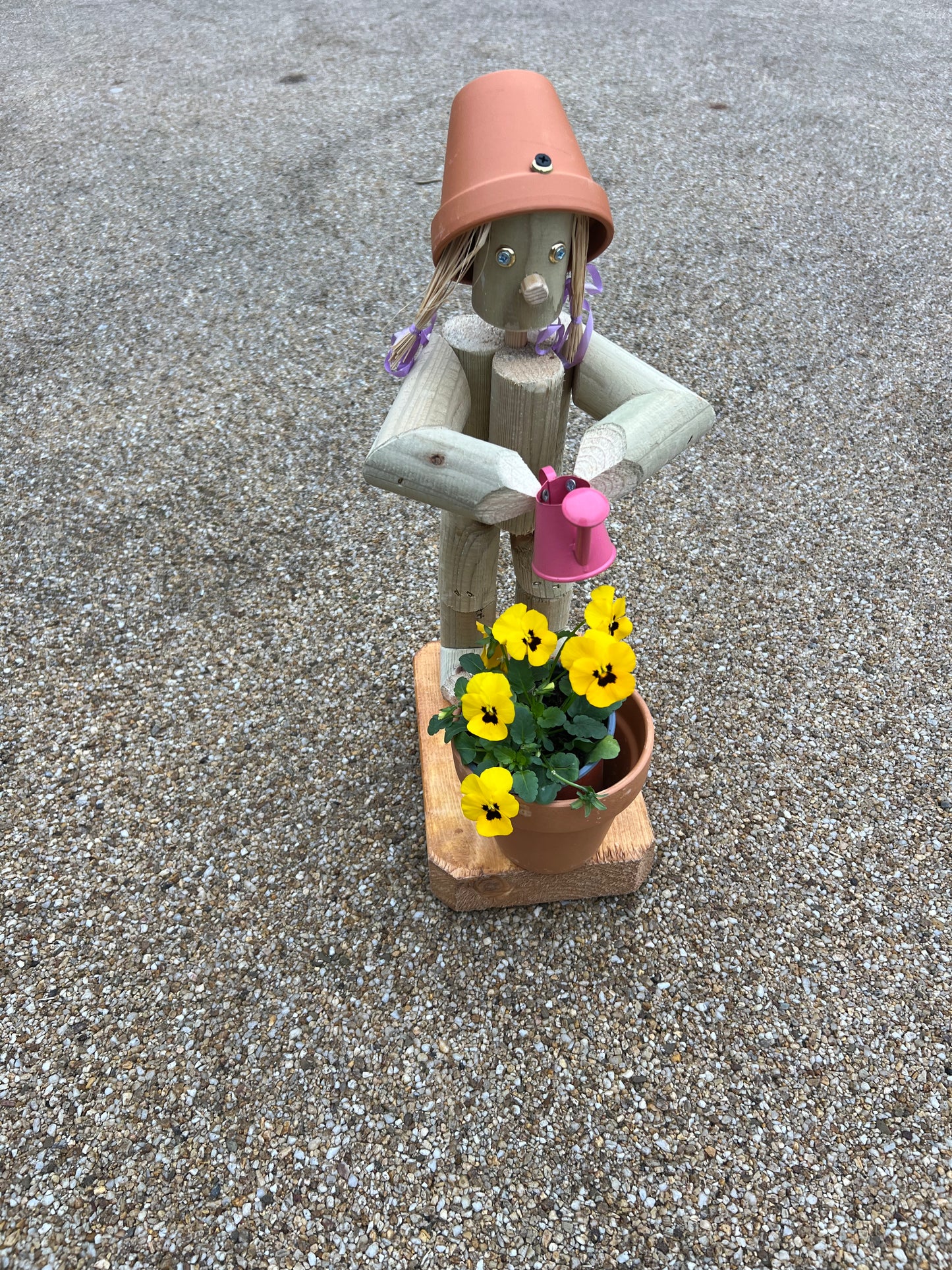 Little Girl or Boy holding a watering can