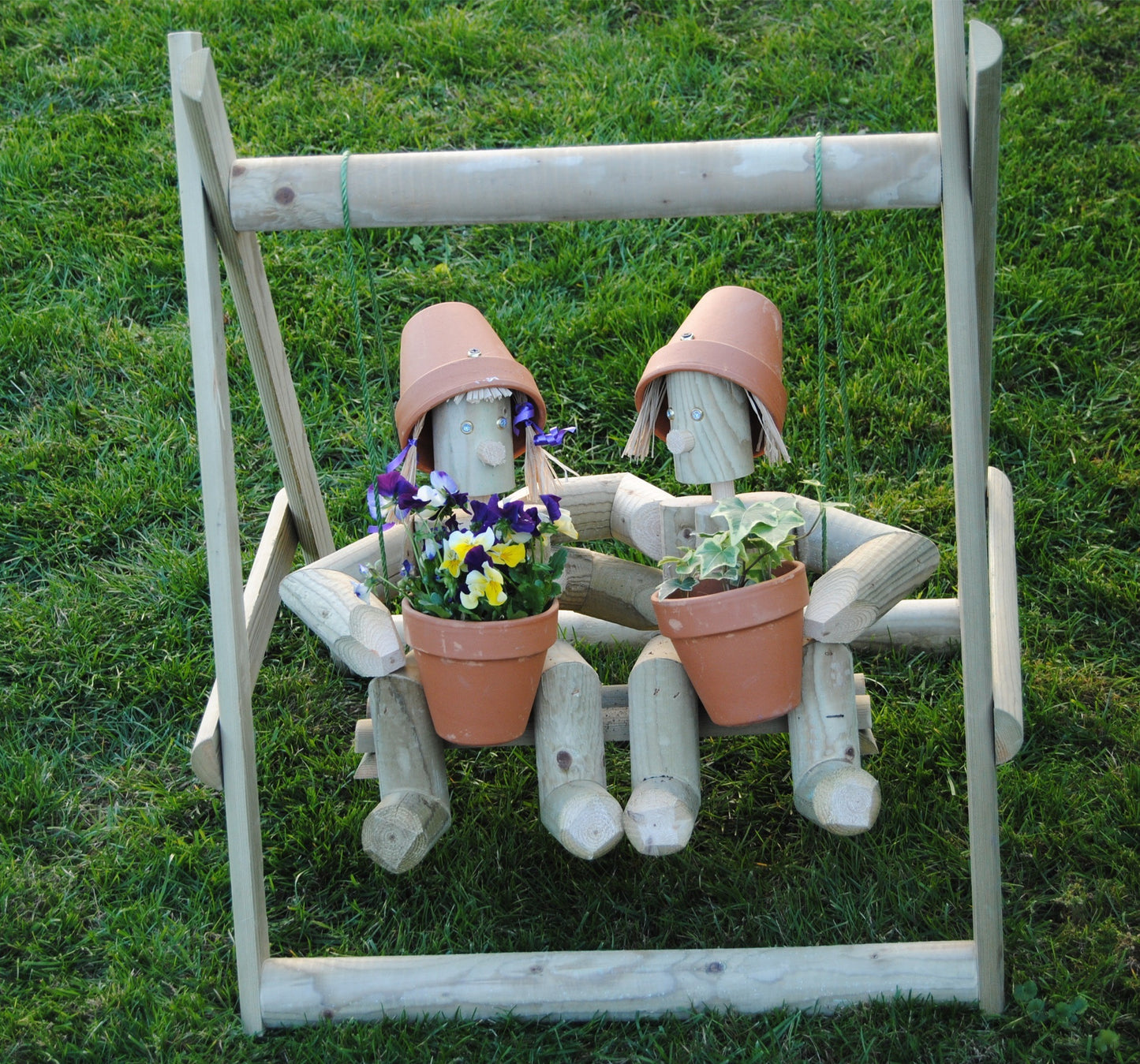 Couple sitting on a swing