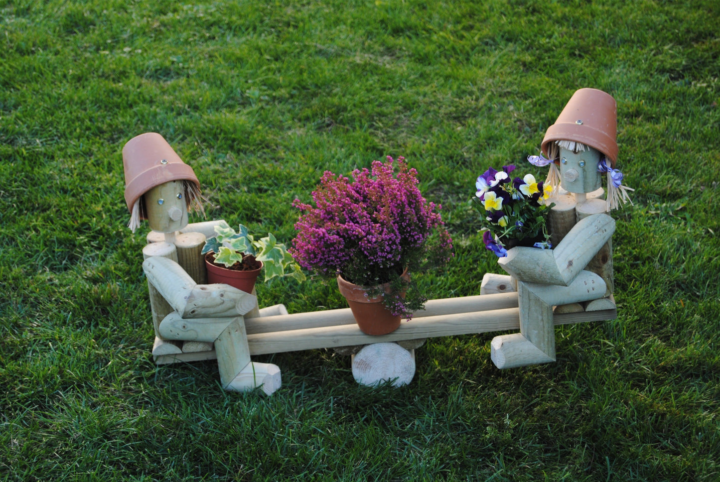 Couple on a seesaw