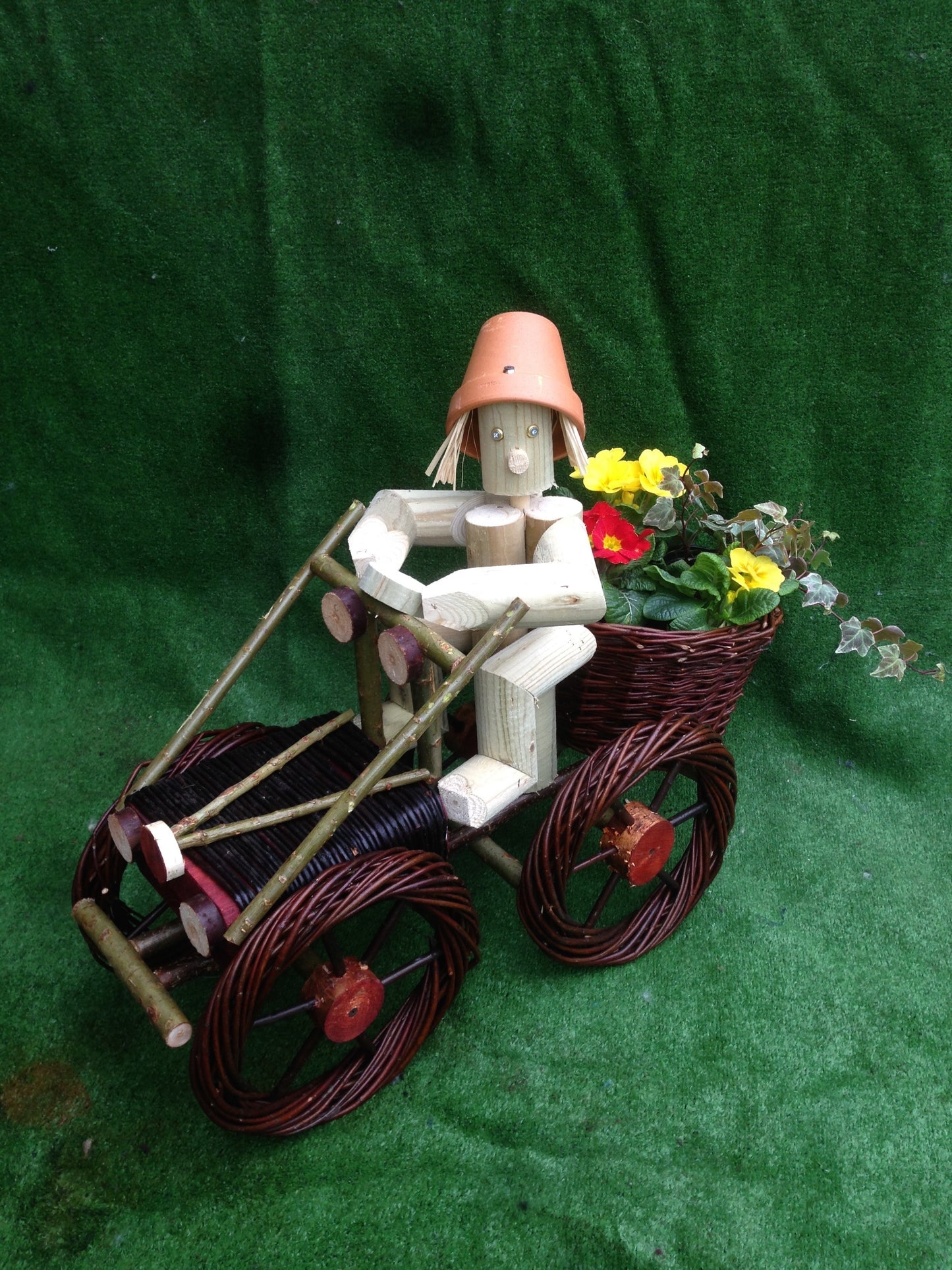 Boy on a big dark off-road vehicle