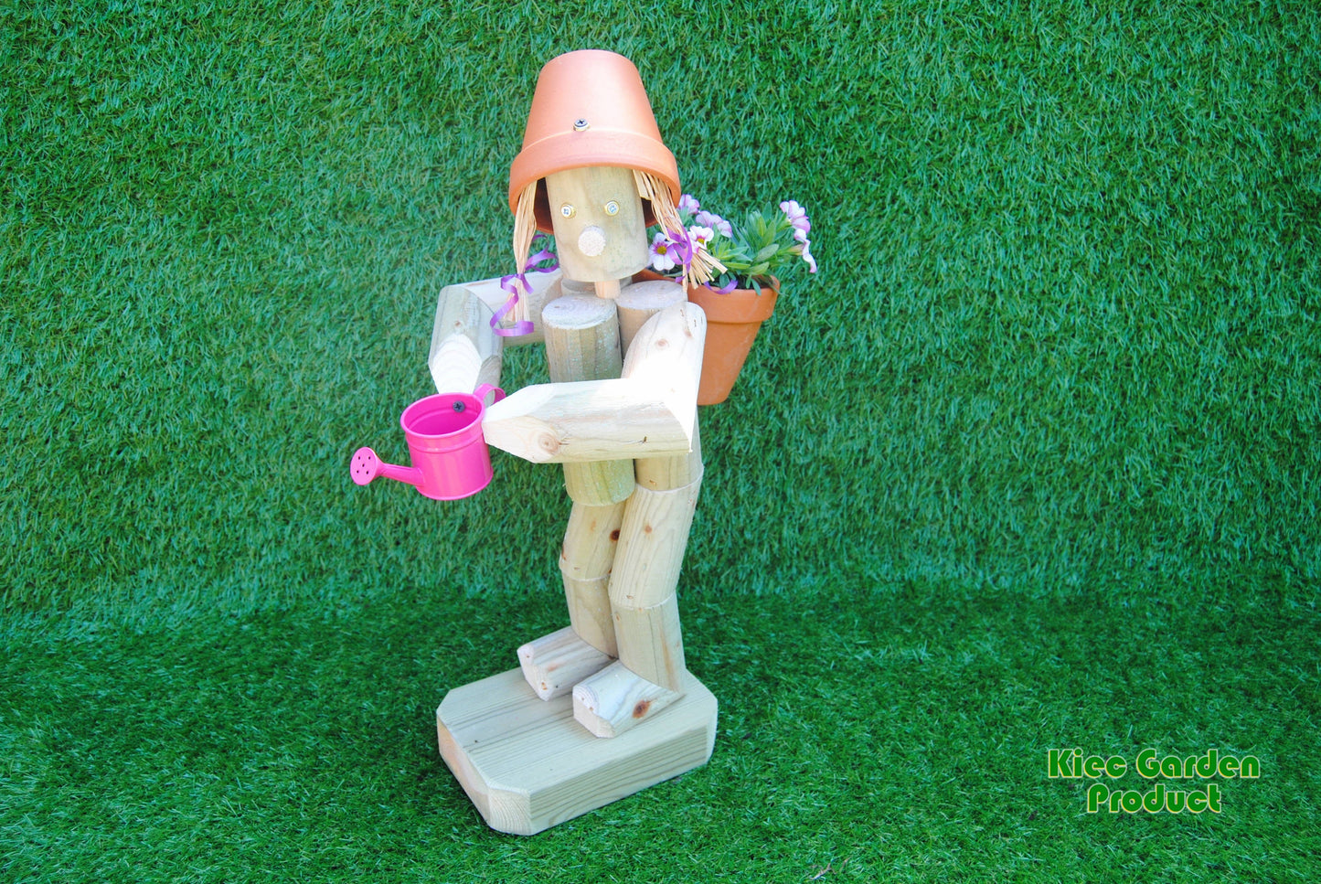 Girl or boy  holding a watering can