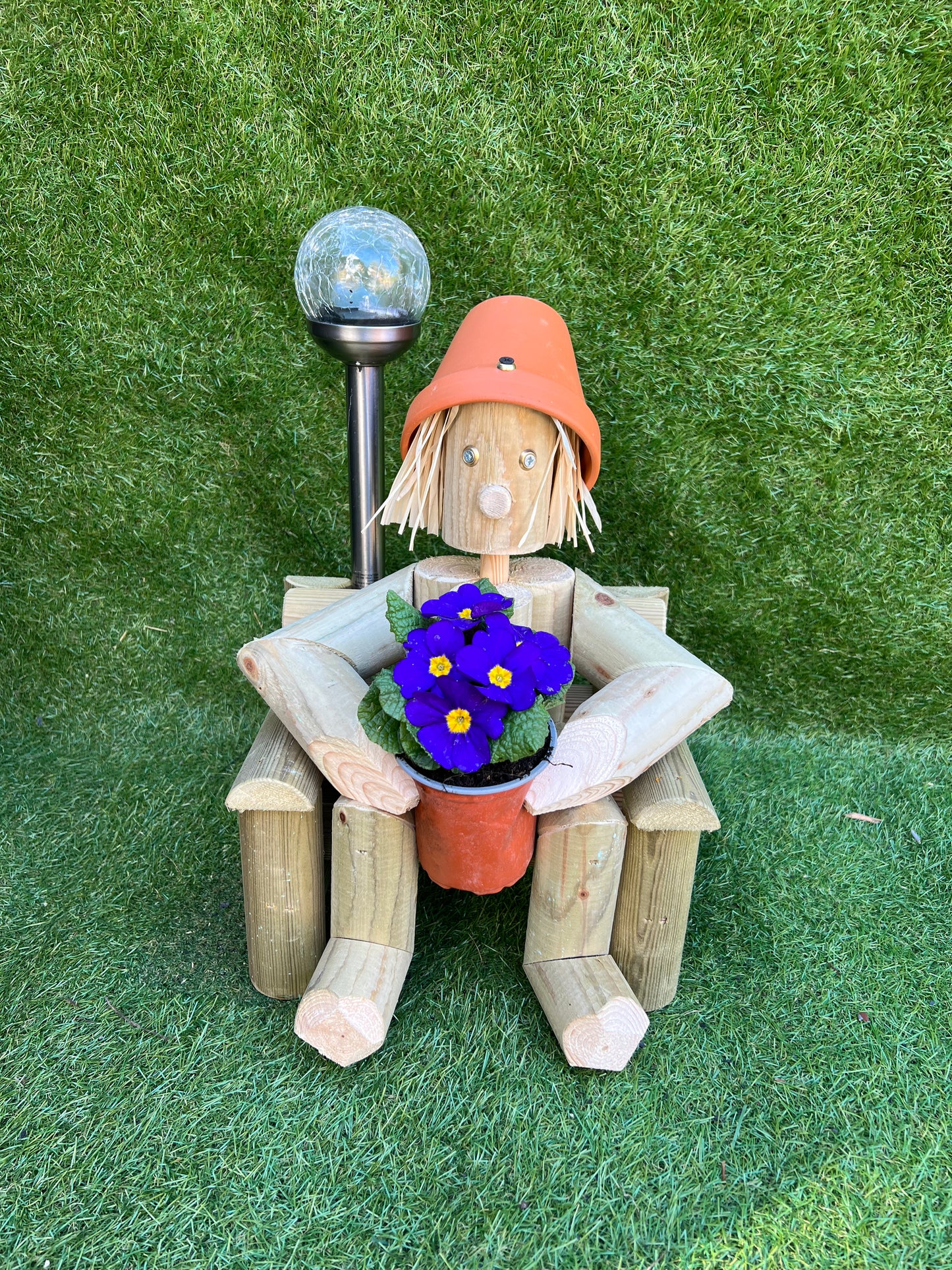 Girl or boy sitting on a chair with solar light