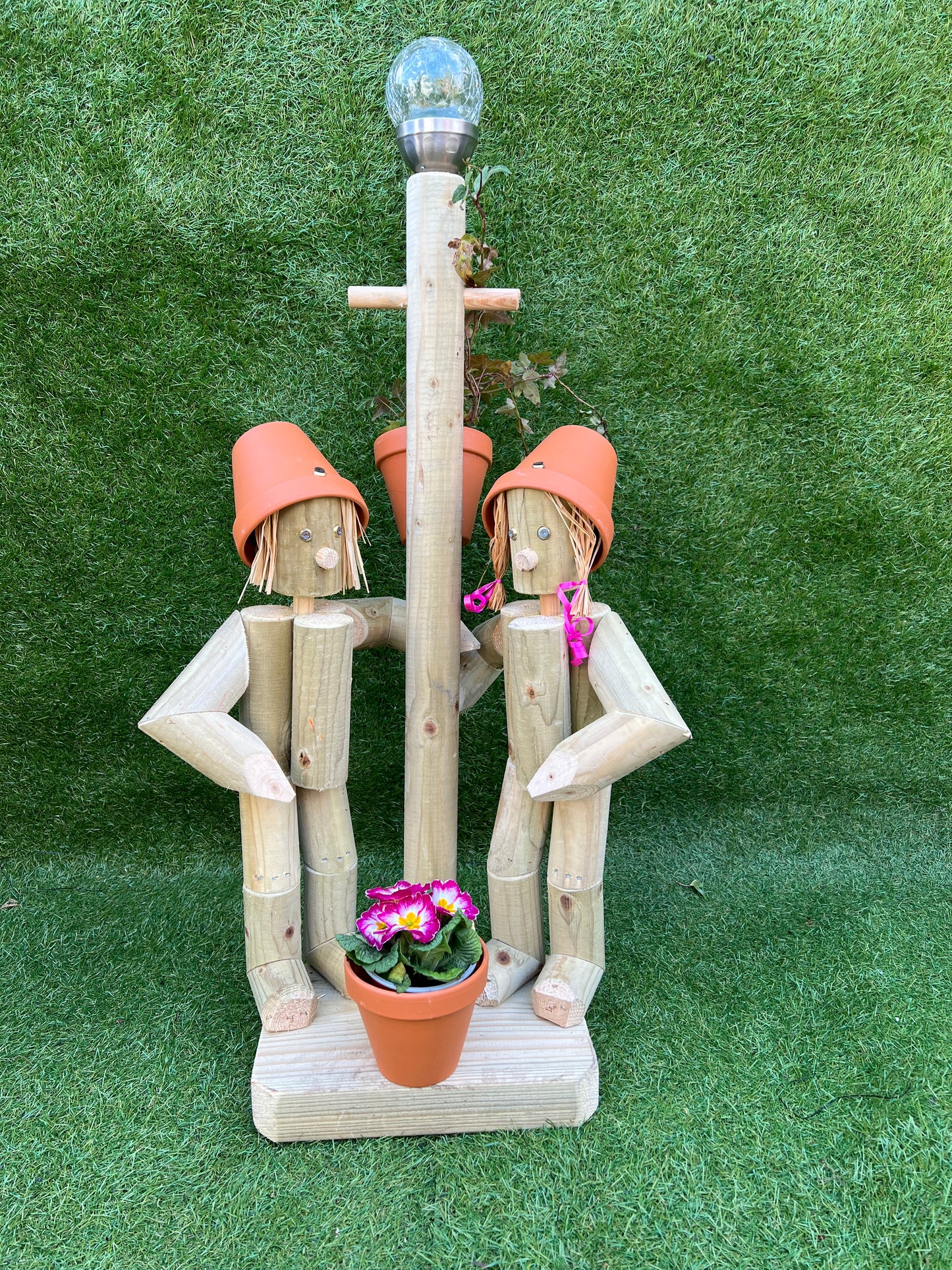 Couple with a lamp post