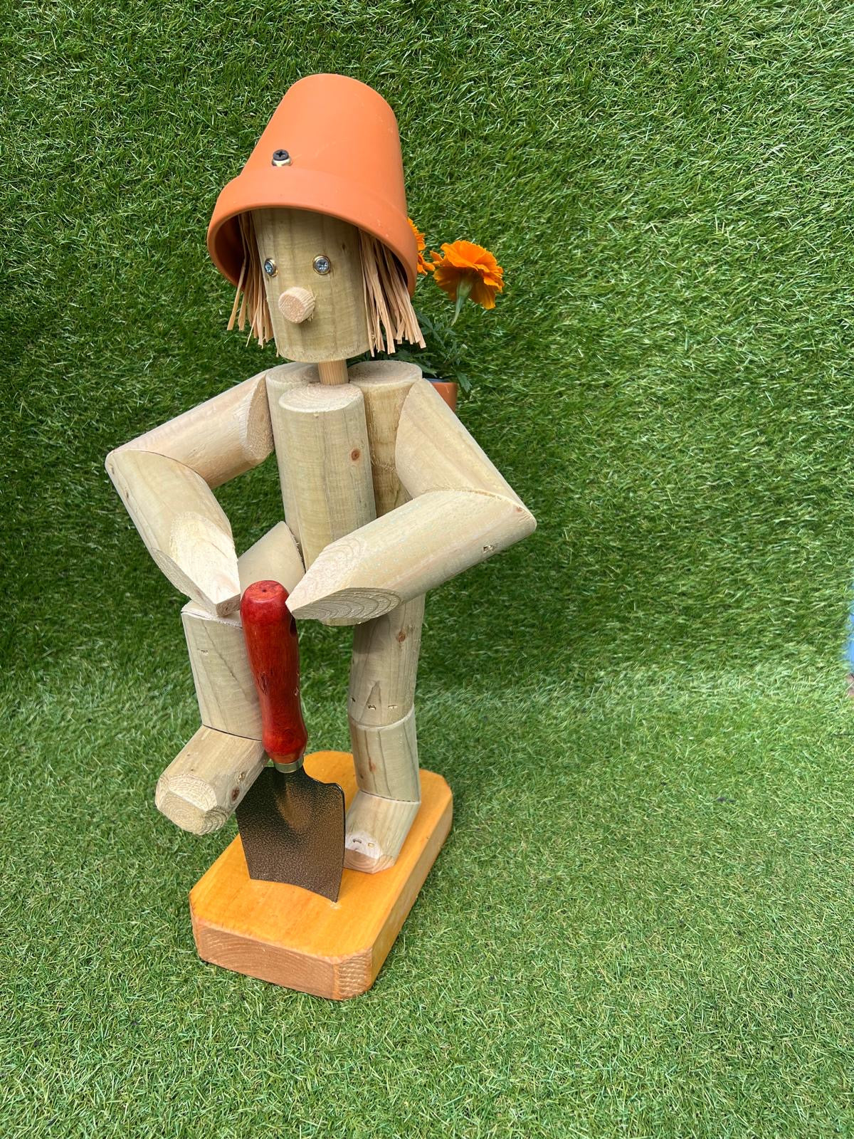 Girl or Boy Holding a shovel