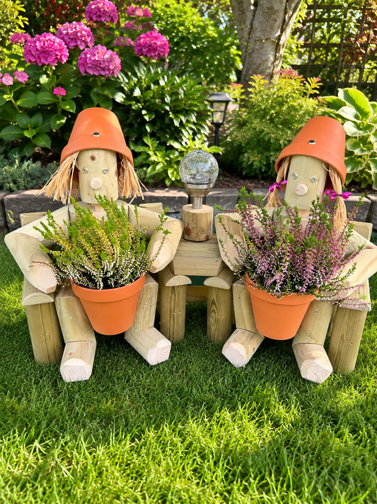 Boy and Girl Flowerpot Figures with Solar Light and Centre Table