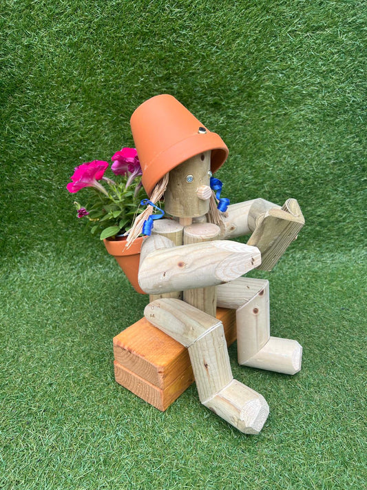 Girl or Boy reading a book