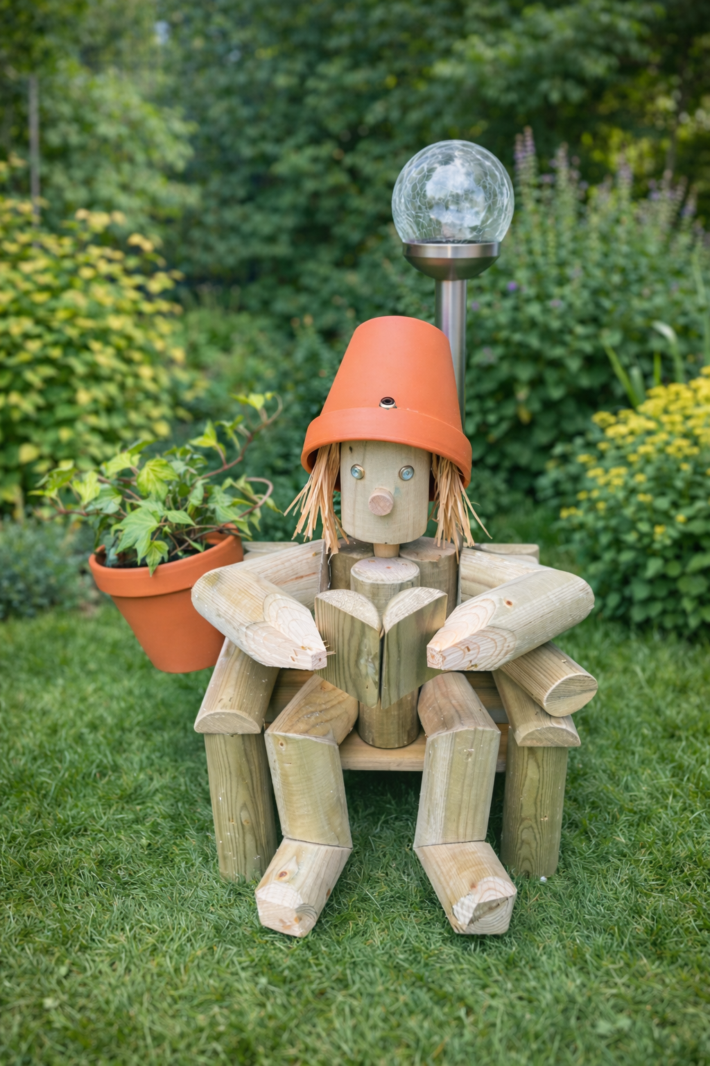 A girl or Boy sitting on a chair reading a book with a solar lamp