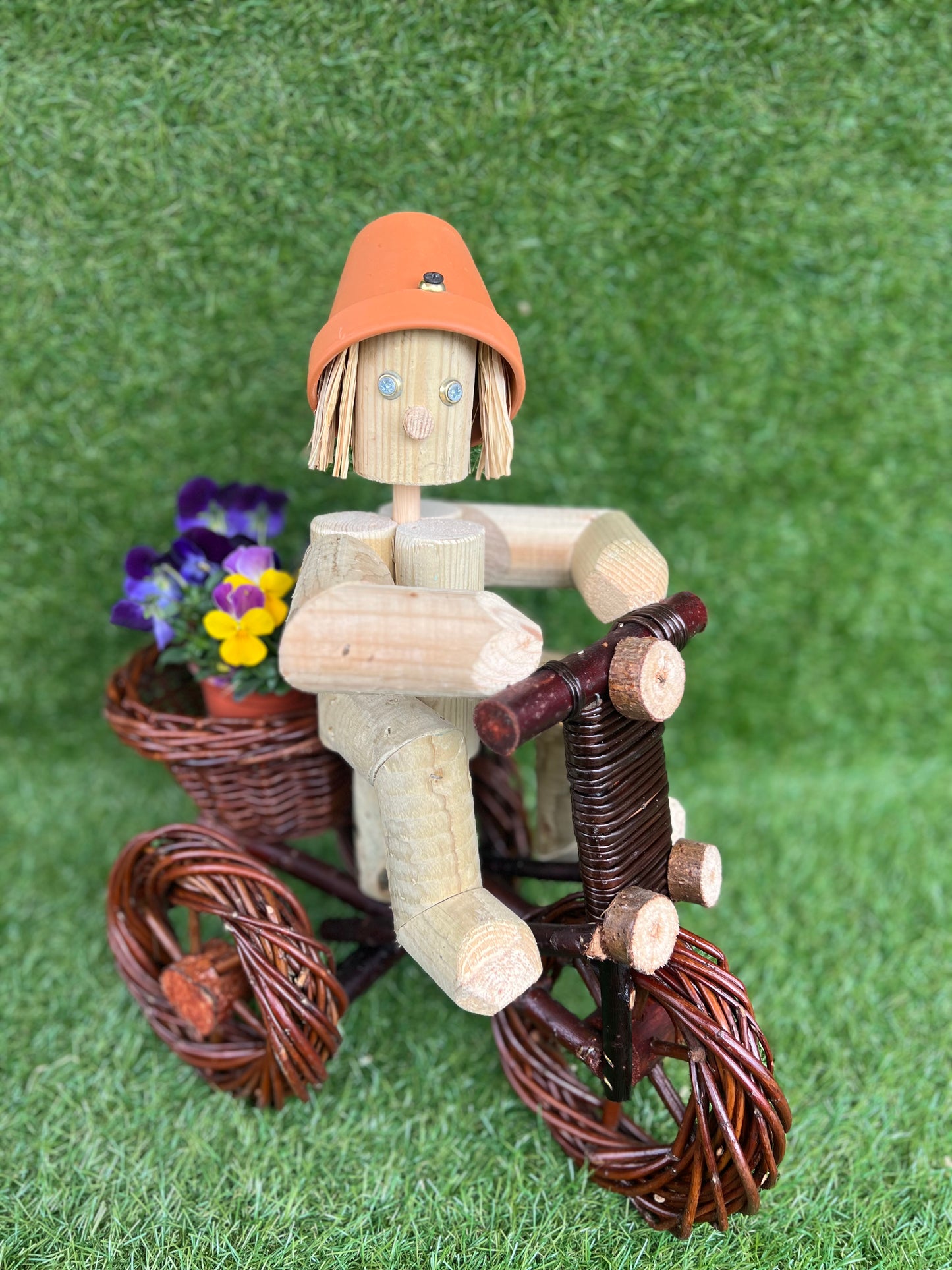 Girl or Boy on a small dark wika bike