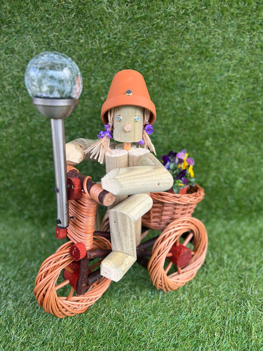 Girl or Boy on small a bright wika bike with solar light