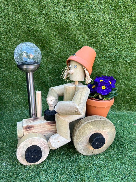 small wooden tractor with solar light